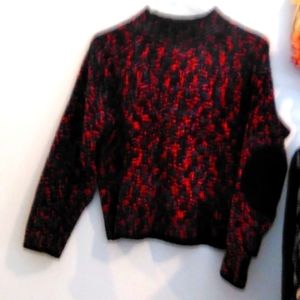 100 percent acrylic long sleeved sweater.